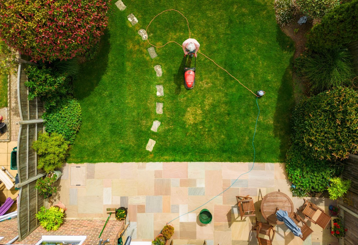 Lawn mowing in a residential garden
