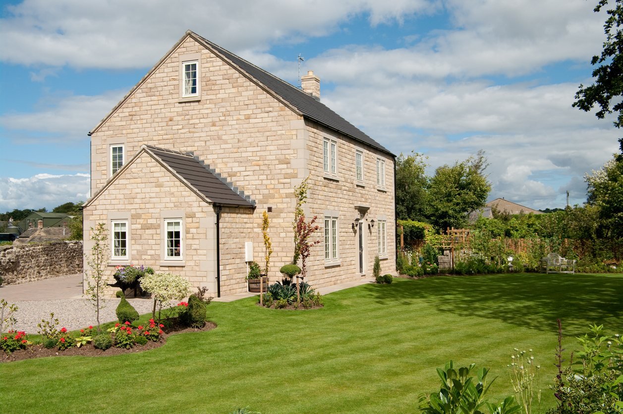 New house with a landscaped lawn